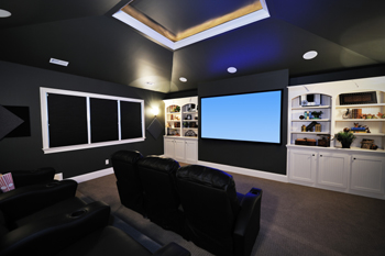 contemporary home theater with two rows of custom theater seating